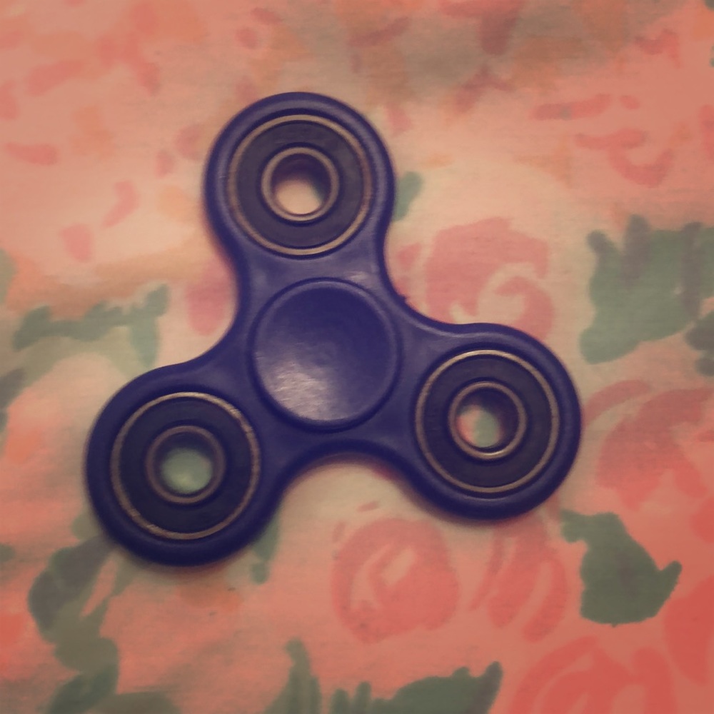 Dark blue fidget spinner.